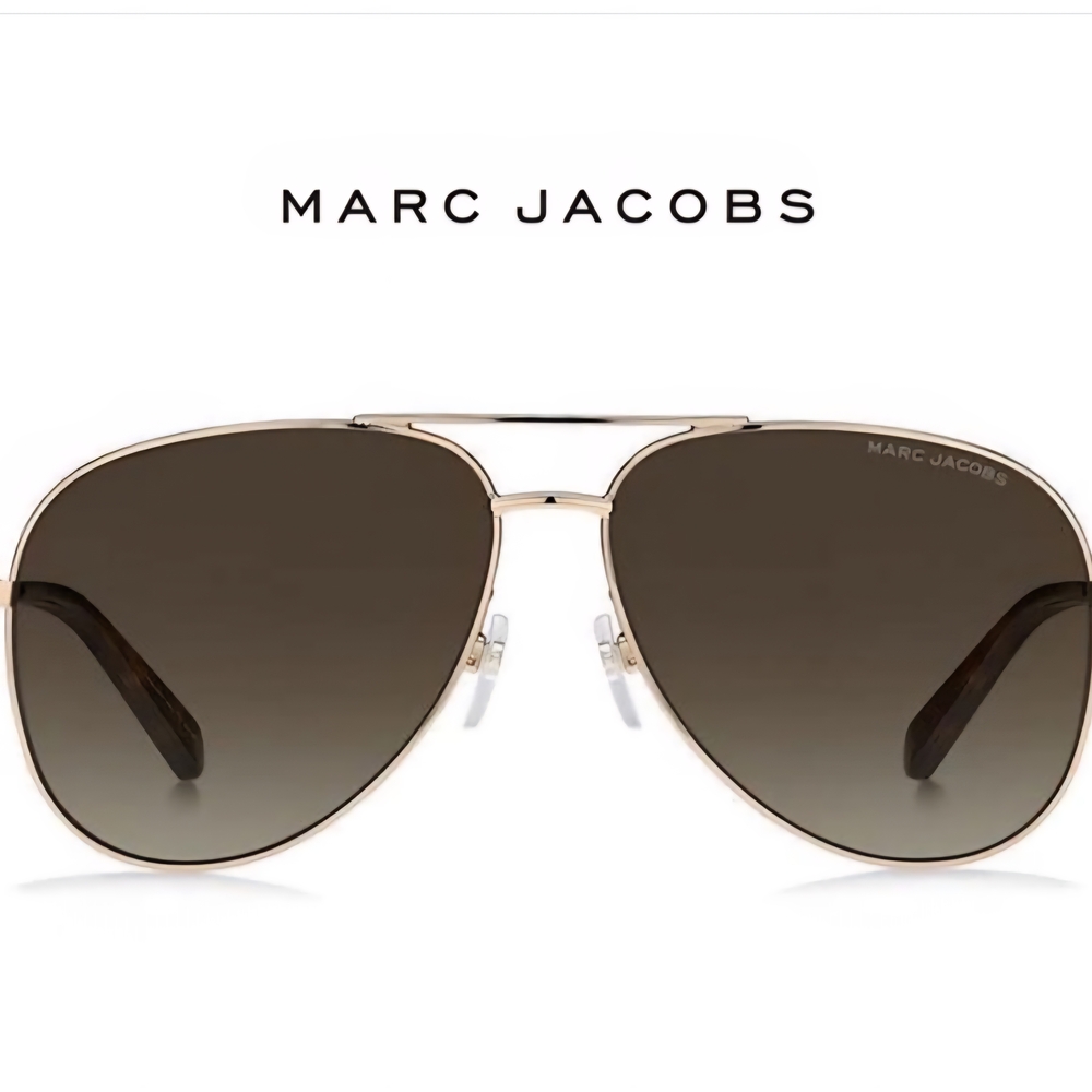 Aviator Marc Jacobs sunglass comes in a gold and brown frame with brown lens